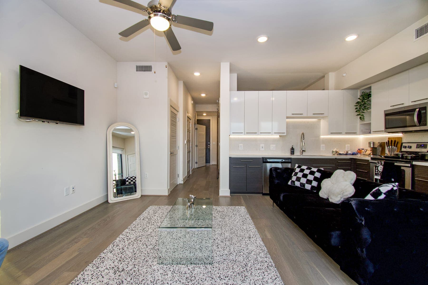 Modern white and gold apartment living area